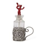 A red devil glass snuff bottle with silver stand, Birmingham, c.1906, Levi & Salaman, the