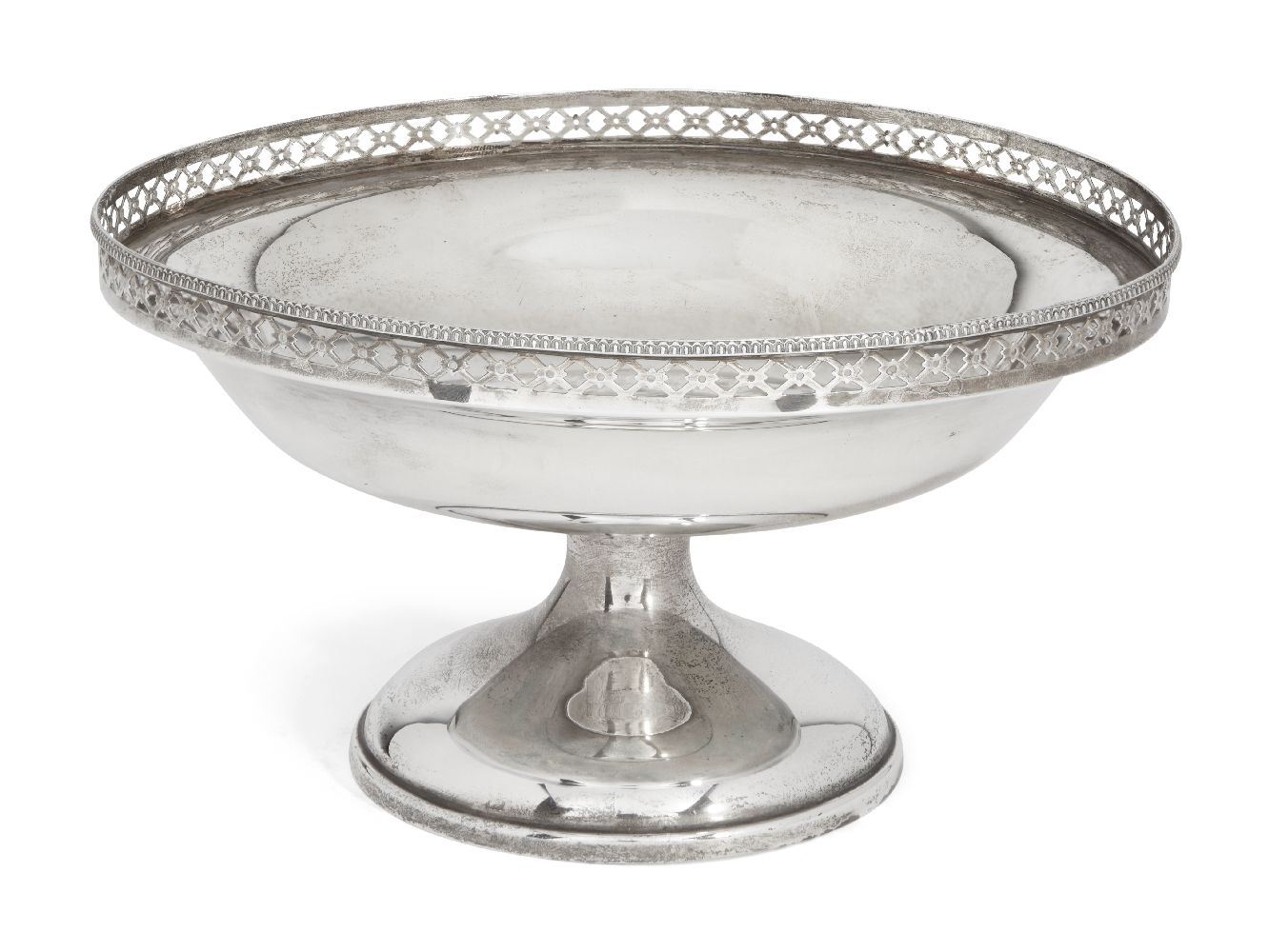 A silver tazza with pierced sides, Birmingham, c.1923, Wilson & Sharp, raised on a plain,