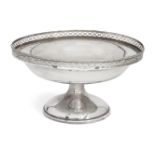 A silver tazza with pierced sides, Birmingham, c.1923, Wilson & Sharp, raised on a plain,