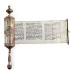 A silver cased Esther scroll, megillah, the case signed Bezalel, Jerusalem, c.1920, the scroll