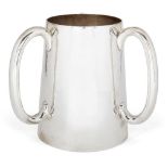 A large Arts & Crafts period three-handled silver tankard (tyg), London, c.1892, Wakely & Wheeler,