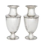 A pair of silver vases, Birmingham, c.1911, D. & B. Co Ltd., of baluster form, each raised on a
