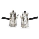 A matched pair of silver café-au-lait pots, Birmingham, c.1898 and 1903, Hukin & Heath, the tapering