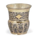 A Russian silver niello liqueur cup, Moscow, assay master and date marks rubbed, maker EE, the