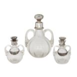A bulbous silver mounted decanter and pair of whisky tots, the decanter Birmingham, c.1920, John