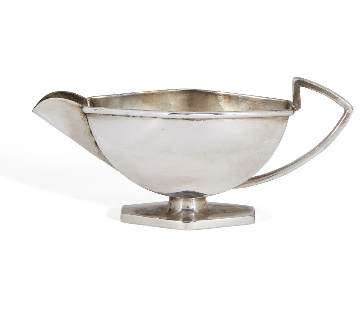 An Art Deco silver milk jug on hexagonal foot, Birmingham, c.1934, Roberts & Dore, of elongated