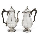 An Edwardian silver coffee pot, Chester, c.1907, Barker Brothers, together with a matched hot