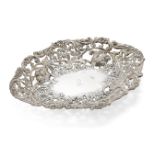 A pierced Victorian silver dish, London, c.1885, Charles Stuart Harris, of oval form, the repousse