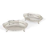 A pair of silver dishes with pierced galleries, Birmingham, c.1933, JPH, of shaped, oval form,