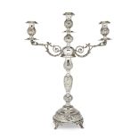 A silver three-branch candelabra, London, c.1919, Rosenzweig, Taitelbaum & Co., the central