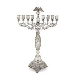 A large silver menorah by Joseph Zweig, London c.1917, in the Polish manner, the baluster column