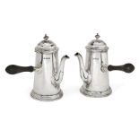Two silver café-au-lait pots, one Sheffield, c.1912, maker's mark rubbed, the other Sheffield, c.