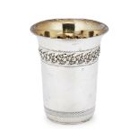 A silver Kiddush cup, stamped ST925, of plain, cylindrical form with a single floral repousse band