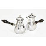 A pair of Edwardian silver café-au-lait pots, Chester, c.1906, George Nathan & Ridley Hayes, of