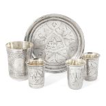 A small collection of Russian silver, comprising: three small silver shot cups, one Kiev, 1908-1926,
