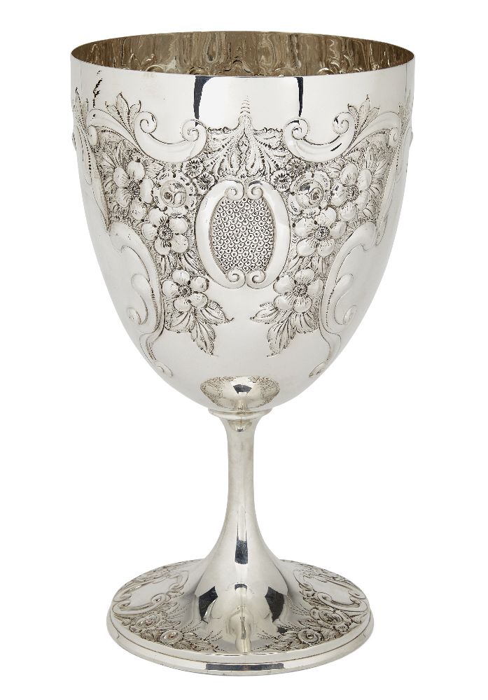 A large Edwardian silver goblet, Sheffield, c.1908, Joseph Rodgers & Sons, repousse decorated with