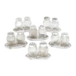 A set of six silver mounted cruet pairs, the monogrammed silver stands by Fritz Bemberg (active c.