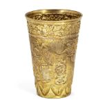 A gilt metal cup, apparently unmarked, chased with scenes depicting the sacrifice of Isaac, 12 cm