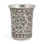 A white metal niello decorated beaker, spurious marks, decorated with foliate patterns and a scene