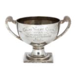 A twin-handled silver trophy cup, Sheffield, c.1921, James Deakin & Sons, raised on a square foot,