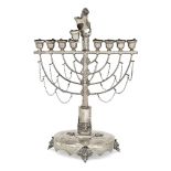 A large Austro-Hungarian menorah, mid 19th century, stamped only with 13 standard mark, designed