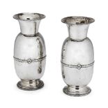A pair of Arts & Crafts hammered silver vases, Birmingham, c.1923, Albert Edward Jones, of rounded