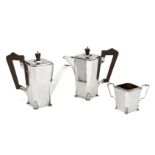 A three-piece silver café-au-lait set, Birmingham, c.1933, William Lister & Sons, each piece of