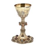 A Victorian silver gilt chalice, London, c.1898, Lambert & Co., the scalloped foot designed as a