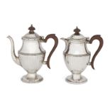 A pair of silver café-au-lait pots, Birmingham, c.1928, Mappin & Webb, the coffee pot and hot milk