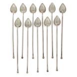 Eleven silver cocktail straws, stamped Sterling, each designed as a heart-shaped spoon to a long