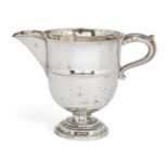 An Edwardian silver jug, London, c.1909, Charles Boyton & Son Ltd, of rounded form, with acanthus