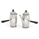 A pair of silver café-au-lait pots, Birmingham, c.1934, Barker Brothers, of elongated barrel form