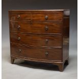 A Regency bow-front mahogany chest, with two short of three long graduated drawers, raised on shaped