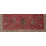 A Chinese silk embroidered silk panel, late Qing dynasty, decorated in gold couched stitch with