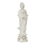 A Chinese porcelain blanc-de-chine figure of Guanyin, Republic period, modelled with long flowing
