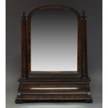 A large Victorian mahogany toilet mirror, the arched plate on cylindrical tapered column supports,