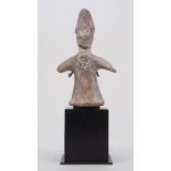 AMENDMENT. Please note this lot is 20th Century. A carved stone figure, in the Antiquarian style