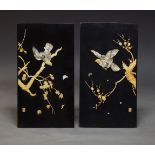 A pair of Japanese black lacquer Shibayama type rectangular panels, early 20th century, decorated in