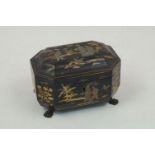 A Chinese lacquer tea caddy, early 20th century, of canted rectangular form, with applied gilt