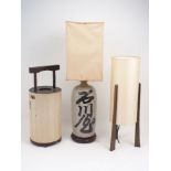 A Japanese ceramic vase converted to a table lamp, with calligraphy to the exterior and fixed wooden