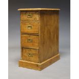 A pine chest of drawers, comprising 19th Century elements, with four drawers, raised on plinth base,