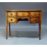 A Regency style mahogany and crossbanded bow front sideboard, early 20th Century, with central