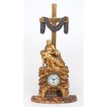 A French giltwood thirty-hour mantel clock, mid-19th century, carved with Mary holding Christ