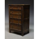 An oak chest, early 20th Century, with five graduated drawers, raised on stile feet, 100cm high,