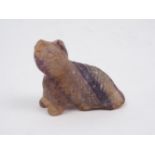 A blue john carving of a cat, modelled sitting, 3.5cm highPlease refer to department for condition