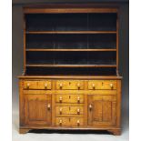 Amendment - please note this dresser is 19th Century, not George III as described in the cataloguin