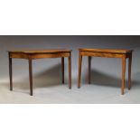 A mahogany and line inlaid tea table, second half 20th Century, with fold over top raised on