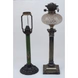 Two oil table lamps, 19th Century, one modelled as a white metal Corinthian column with a clear