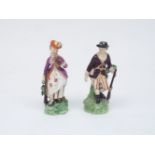A pair of Derby porcelain figures, circa. 1775, designed as a huntsman and his female companion,