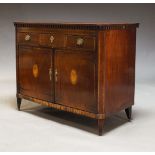 A Dutch mahogany and inlaid side cabinet, early 19th Century, with dentil moulded frieze above three